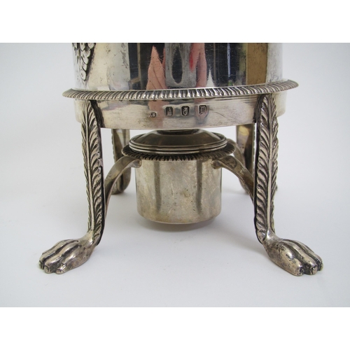 191 - An Irish silver hot water pot on stand with burner