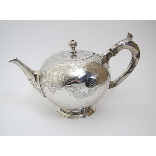 193 - An 18th Century bullet shaped silver teapot