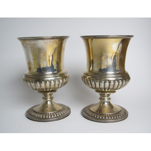 198 - A pair of George IV silver gilt goblets