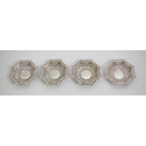 212 - A set of four silver octagonal pierced bonbon dishes