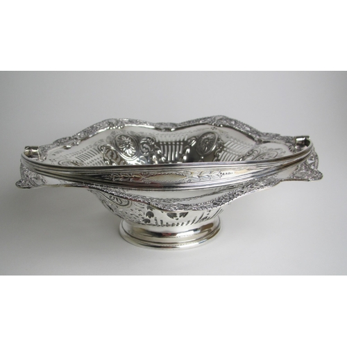 220 - An Edwardian silver pedestal swing handled basket