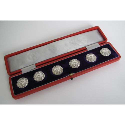 224 - A cased set of six Edwardian silver buttons