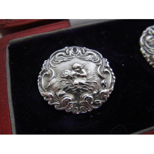 224 - A cased set of six Edwardian silver buttons