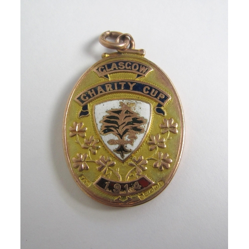 247 - Of Celtic F.C interest  nine carat gold football medal