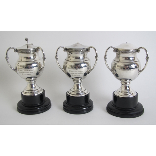 253 - Three silver 'North Mail' Challenge Cup Trophies