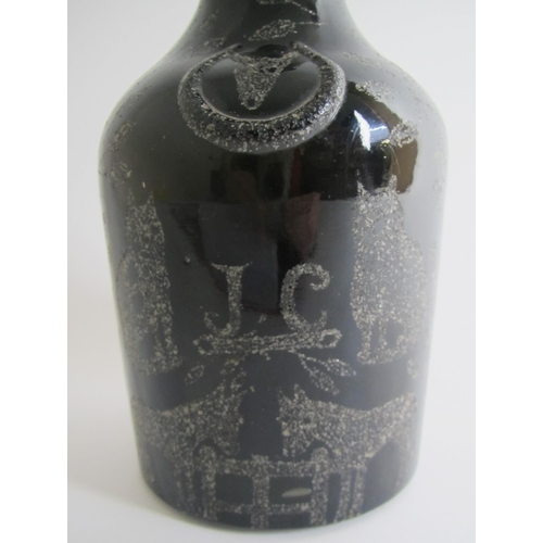 516 - A nail chipped wine bottle