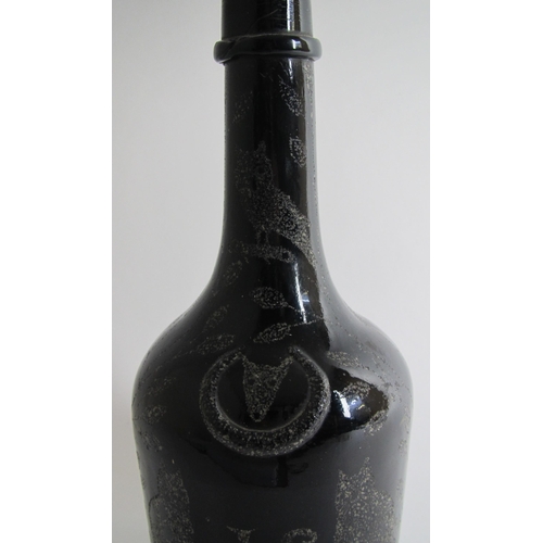 516 - A nail chipped wine bottle