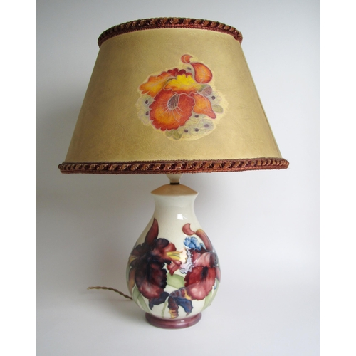 541 - A Moorcroft Orchid pattern table lamp