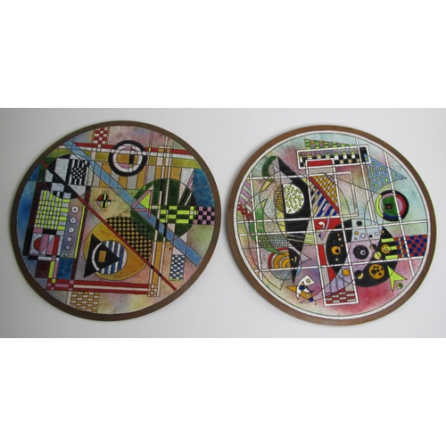 551 - A pair of Vasily Kandinsky style enamel and copper circular plaques