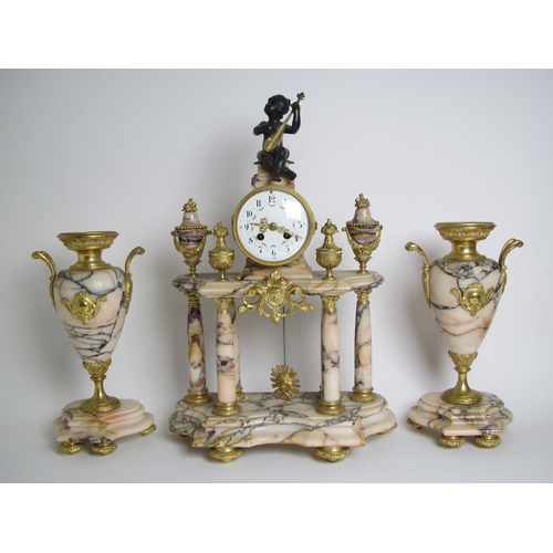 584 - A Louis XVI style marble and gilt metal clock garniture