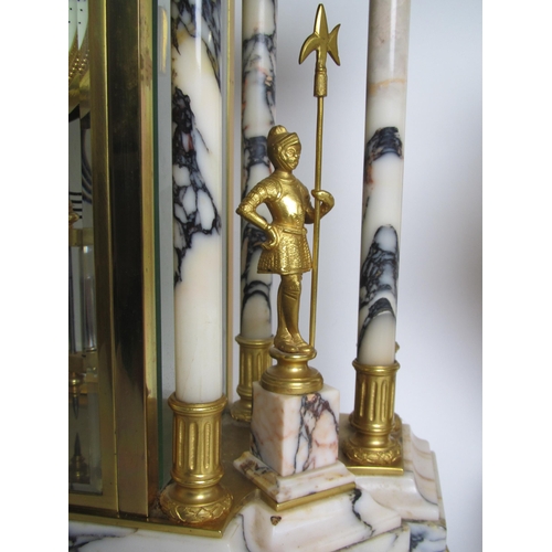 585 - A Louis XVI style marble and gilt metal clock garniture