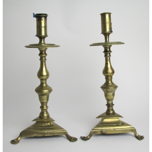 586A - Two Dutch brass candlesticks