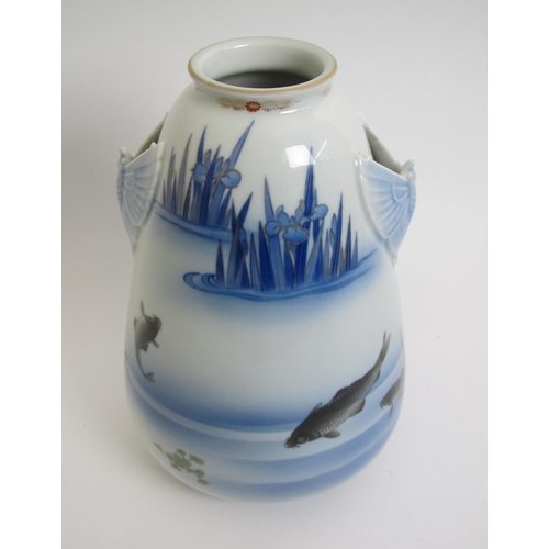 604 - A Fukugawa vase painted with carp