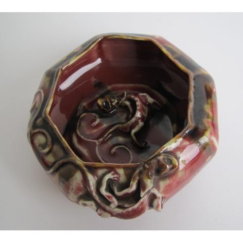 606 - A Chinese octagonal red mottled bowl