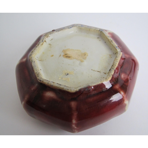 606 - A Chinese octagonal red mottled bowl