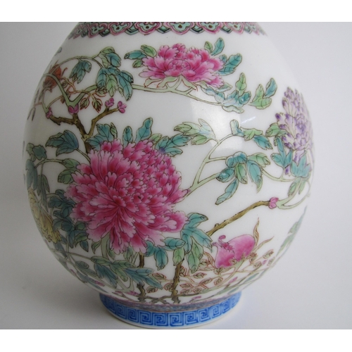 608 - A Chinese famille rose bottle shaped vase