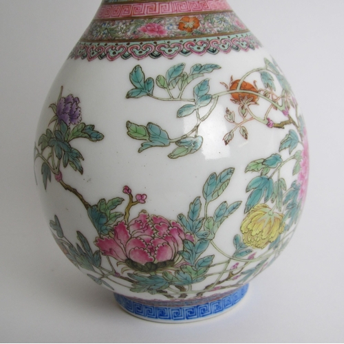 608 - A Chinese famille rose bottle shaped vase