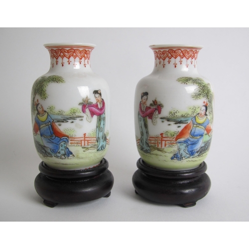 611 - A pair of Chinese eggshell miniature baluster vases