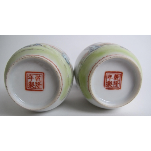 611 - A pair of Chinese eggshell miniature baluster vases