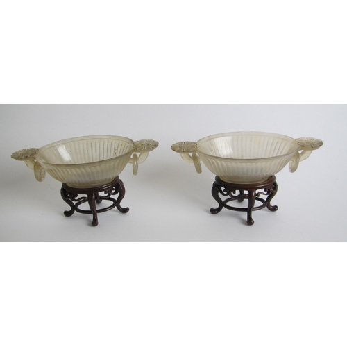 614 - A pair of Chinese agate two handled libation cups