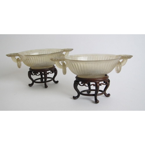 614 - A pair of Chinese agate two handled libation cups