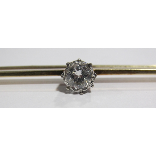 64 - An early 20 th century 18 ct gold and platinum diamond set bar brooch