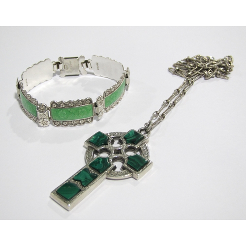 65 - A silver and green guilloche bracelet