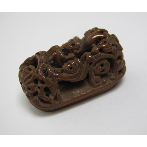 655 - A boxwood carved netsuke