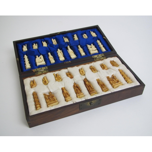 680 - A Chinese carved ivory chess set