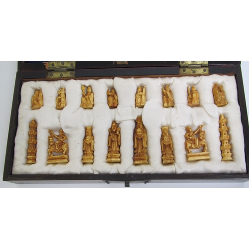 680 - A Chinese carved ivory chess set