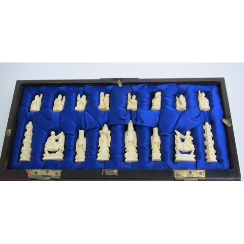 680 - A Chinese carved ivory chess set