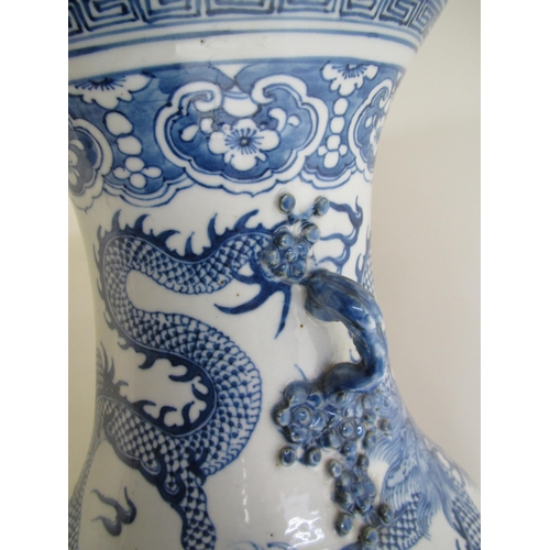 683 - A Cantonese famille rose vase painted with panels of figures