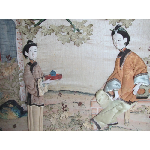 684 - A pair of Chinese export silk embroidered pictures