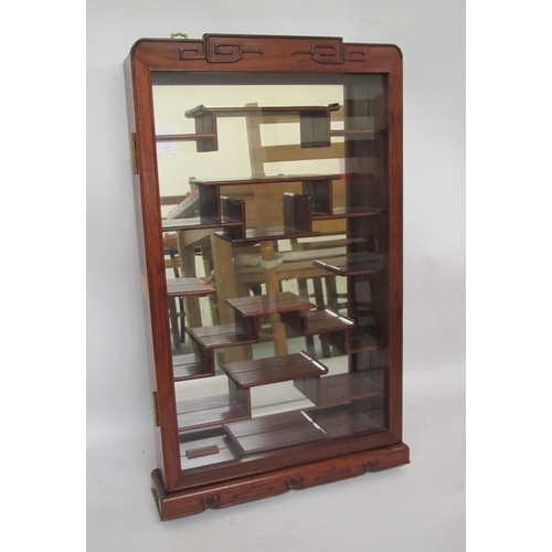 689 - A Chinese hardwood snuff bottle hanging wall cabinet