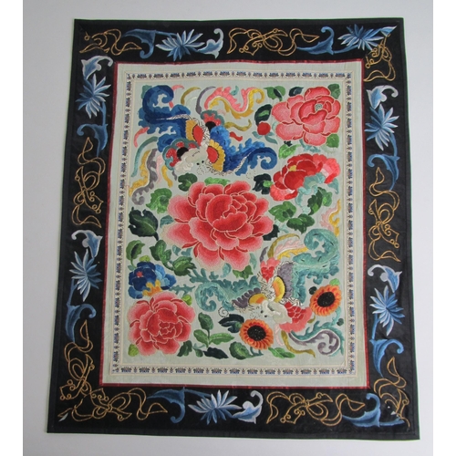 697 - A rectangular panel embroidered in silks