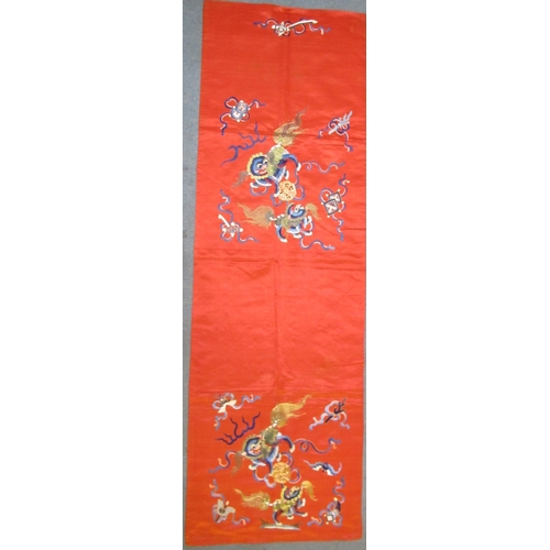 704 - Four various Chinese decorative silk hangings and a chair cover