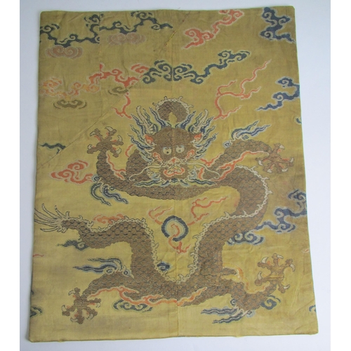 707 - An 18th Century yellow ground dragon robe section