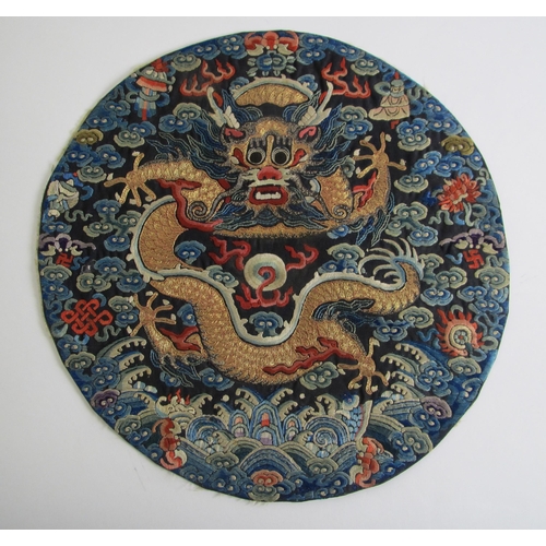 713 - An Imperial dragon roundel from Chao Fu