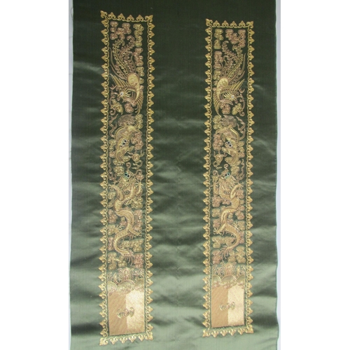 715 - A pair of green silk and gold embroidered sleeve panels