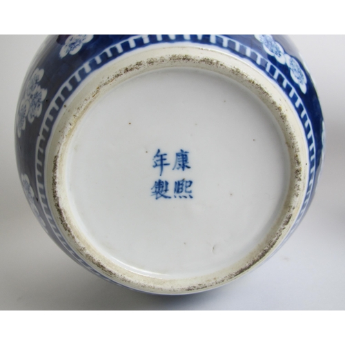 733 - A pair of Chinese blue and white ginger jars