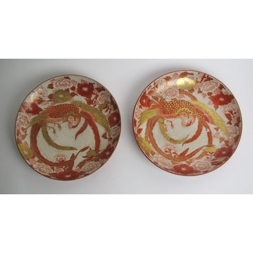 734 - A pair of Kutani pottery dishes