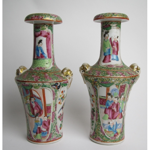 749 - A pair of Canton famille rose baluster vases