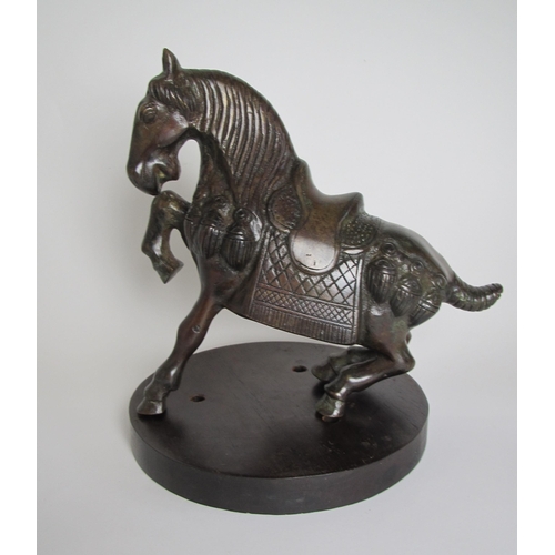 751 - A bronze model of a Tang style horse