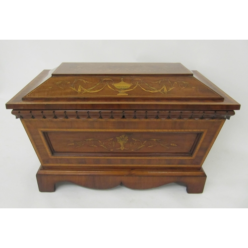 793 - An Edwardian mahogany inlaid sarcophagus shaped wine cooler