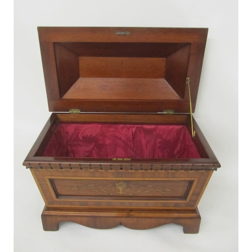 793 - An Edwardian mahogany inlaid sarcophagus shaped wine cooler