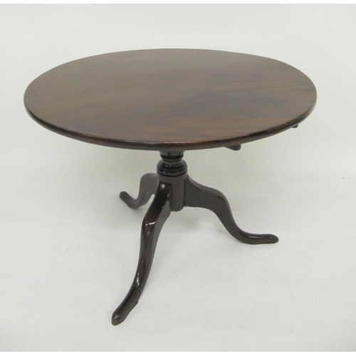 834 - A 19th Century mahogany circular snap top table