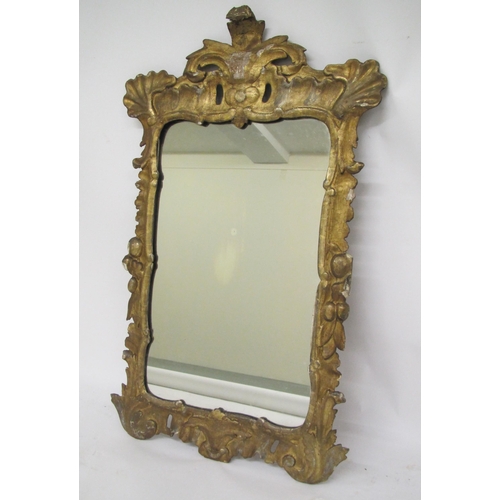 837 - A mid 18th Century gilt decorated wall mirror