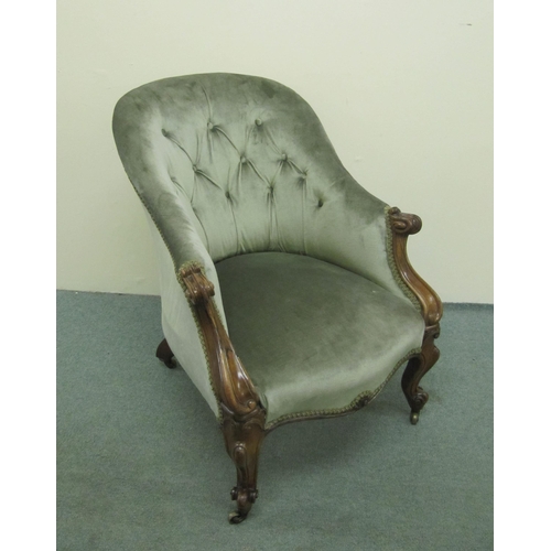 839 - A Victorian walnut buttonback armchair