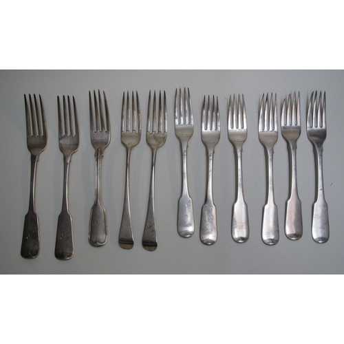 203 - A composite suite of Georgian and Victorian silver cutlery