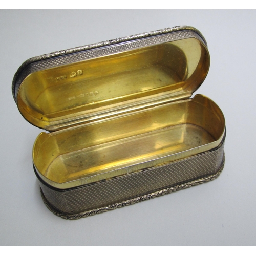 219 - A fine George IV silver gilt oval shaped snuff box